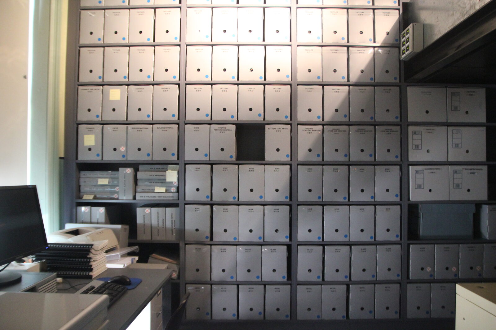 Archive room with shelves of boxes and records